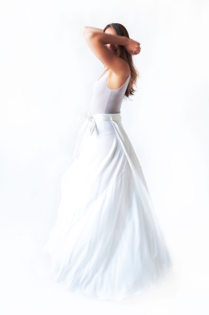 Model in silk satin Healer Skirt  in color white side view