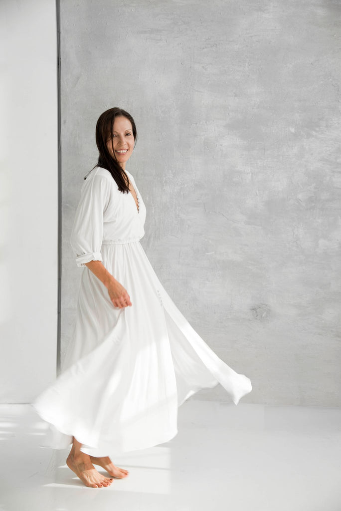 Rachel Ackley in organic cotton button down ankle long dress in white side view