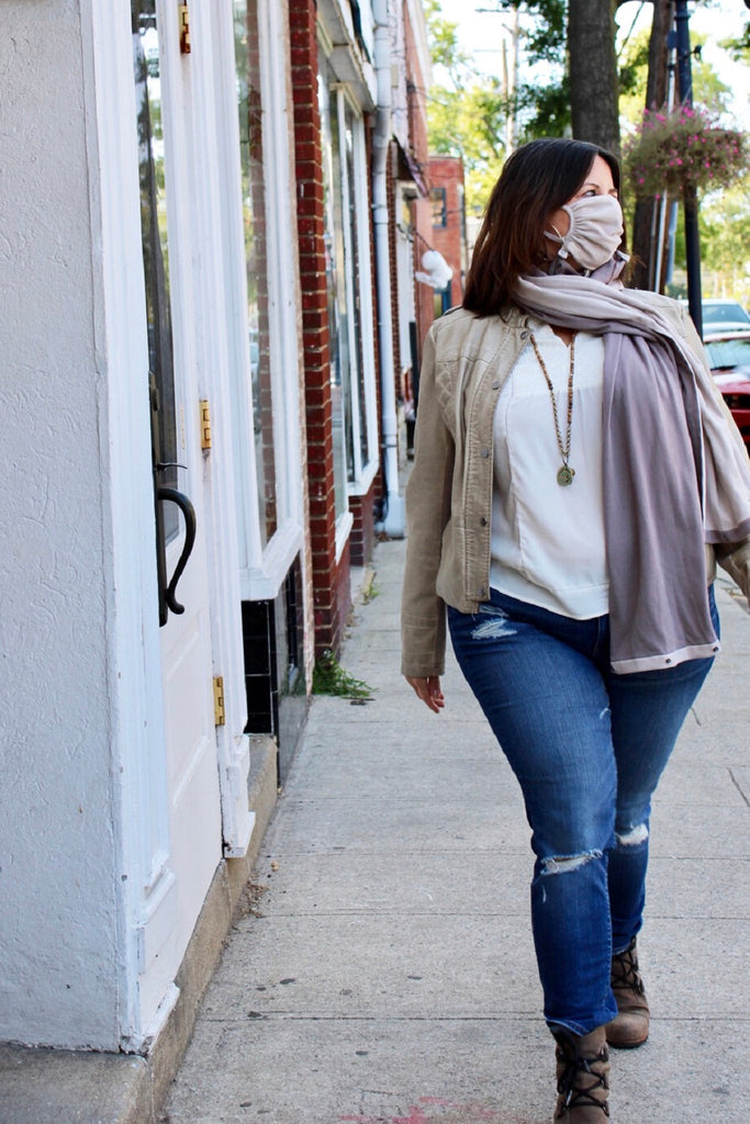 Christine Mammes in organic cotton mask and scarf in color cloud walking on the street