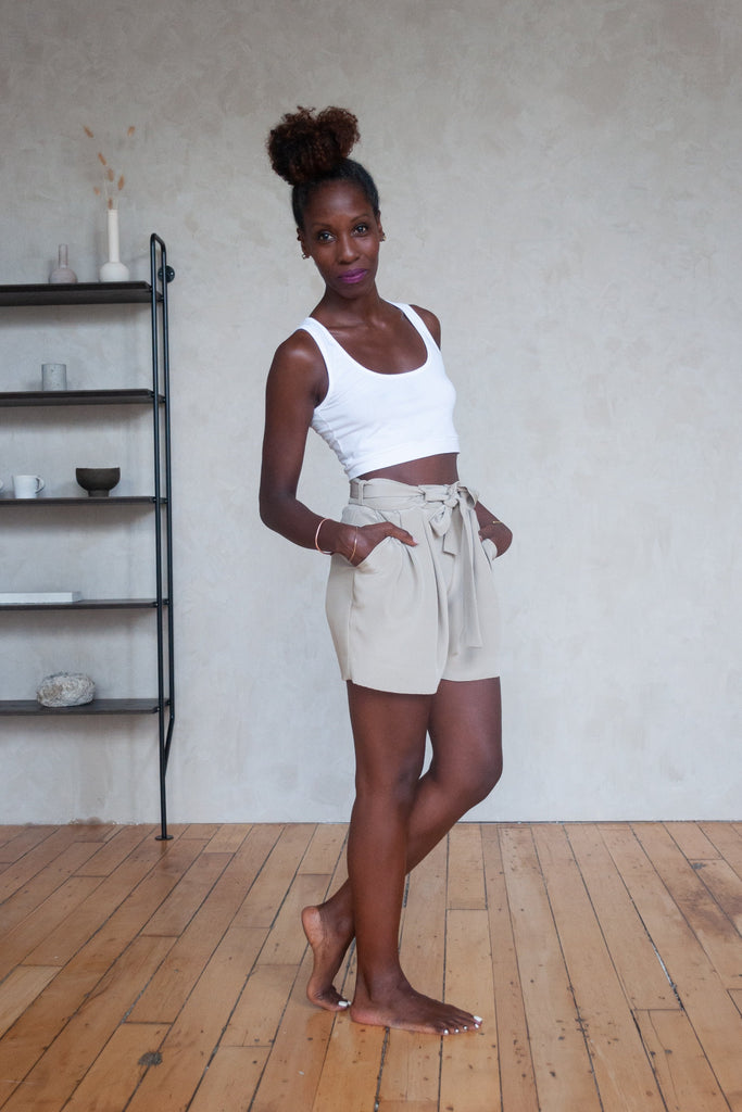 Ssanyu in white organic cotton crop tank and 4 ply silk crepe paper bag tie shorts in color ivory side view