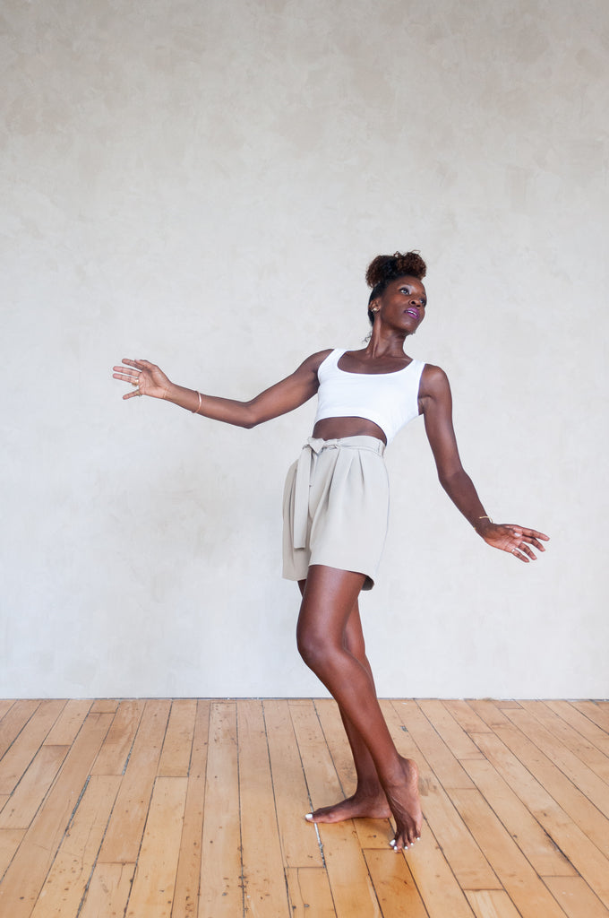 Ssanyu in white organic cotton crop tank and 4 ply silk crepe paper bag tie shorts in color ivory side view